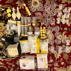Medela pump (used once). Ton of accessories a lot new